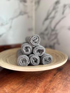a pile of powdered donuts on a plate on a table at Suite 69 in Hurghada