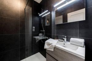 Kúpeľňa v ubytovaní Studio Hypercentre avec vue sur le vieux Lyon AIL