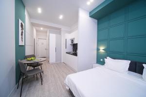 Krevet ili kreveti u jedinici u okviru objekta Sweet Home Apart-Hotel