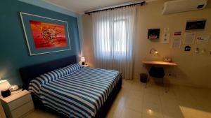 Postel nebo postele na pokoji v ubytování Scilla Guest House -per prenotazioni telefonare-
