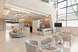TV a/nebo společenská místnost v ubytování Hotel Best 4 Barcelona