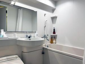 Koupelna v ubytování Nakajimaya Grand Hotel