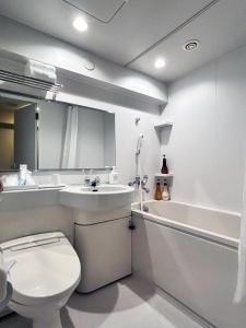 Koupelna v ubytování Nakajimaya Grand Hotel