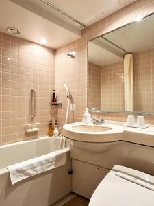Et badeværelse på Nakajimaya Grand Hotel