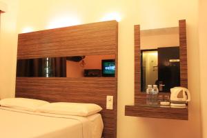 Postel nebo postele na pokoji v ubytování Time Hotel