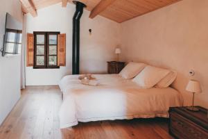 Posteľ alebo postele v izbe v ubytovaní Bergerie de luxe Pietra Rossa