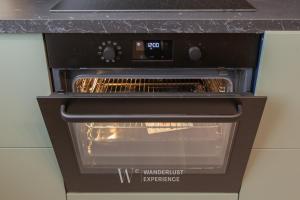 Kuchyň nebo kuchyňský kout v ubytování Wanderlust Experience Mood Apartment