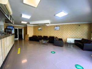 TV a/nebo společenská místnost v ubytování Prima Hotel