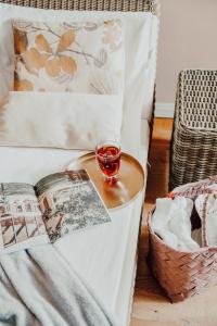Postel nebo postele na pokoji v ubytování Der Eisvogel - Wellness- & Genusshotel
