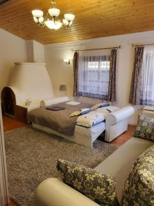 Posteľ alebo postele v izbe v ubytovaní Szilvásváradi Kemencés Apartmanok
