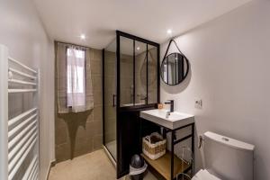 a bathroom with a shower and a sink and a toilet at Ideal studio in the heart of Lyon AIL in Lyon