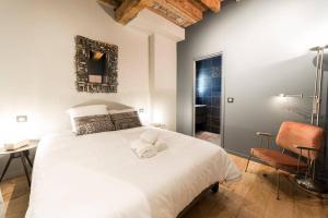 מיטה או מיטות בחדר ב-Jewel apartment in Vieux Lyon AIL