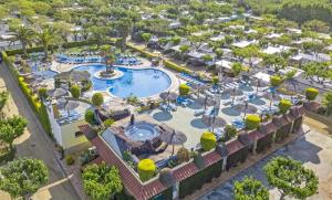 an overhead view of a pool at a resort at Camping La Masia - Maeva Vacansoleil in Blanes