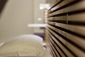 Кровать или кровати в номере Le Duplex du Change - Lyon AIL