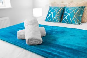 Katil atau katil-katil dalam bilik di Stourbridge 2 Bedroom Apartment - Netflix & WIFI - Parking - Top Rated - 1CS