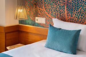 Posteľ alebo postele v izbe v ubytovaní htop Amaika & SPA 4Sup - Adults Only #htopBliss