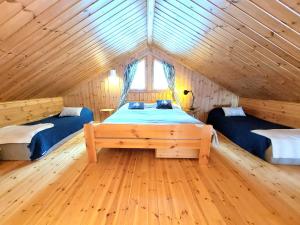 Ένα ή περισσότερα κρεβάτια σε δωμάτιο στο Holiday Home Honkakoli 1 +27 φωτογραφίες