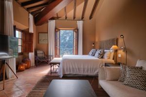 Postel nebo postele na pokoji v ubytování Hotel Valldemossa - The new brand by It Mallorca