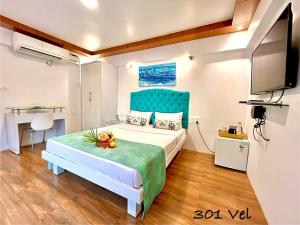 Postel nebo postele na pokoji v ubytování Beach Paradise Miramar Goa