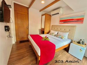 Postel nebo postele na pokoji v ubytování Beach Paradise Miramar Goa