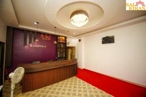Postel nebo postele na pokoji v ubytování Saikiran Hotel + 27 fotografií