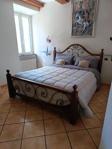 Postel nebo postele na pokoji v ubytování Dimora Garibaldina + 32 fotografií