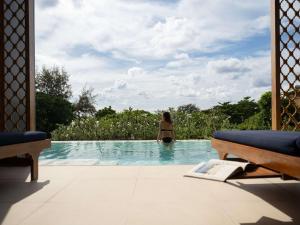 Bazén v ubytování Avista Grande Phuket Karon - MGallery nebo v jeho okolí