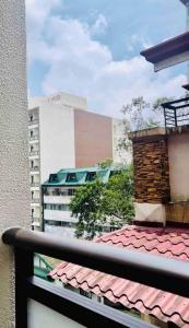 a view from a balcony of a building at Cozy Condo Baguio (Megatower-IV) near Session Road in Baguio