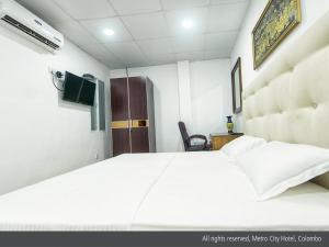TV a/nebo společenská místnost v ubytování Metro City Hotel