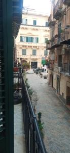 a view of a street from a balcony of a building at Casa Gaia in Palermo