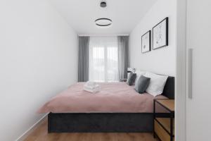 Posteľ alebo postele v izbe v ubytovaní Prokocim Kosocicka Apartment
