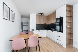 Kuchyňa alebo kuchynka v ubytovaní Prokocim Kosocicka Apartment