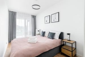Posteľ alebo postele v izbe v ubytovaní Prokocim Kosocicka Apartment