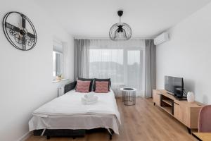 Posteľ alebo postele v izbe v ubytovaní Prokocim Kosocicka Apartment