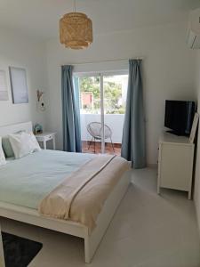 Voodi või voodid majutusasutuse Albur Beach House toas