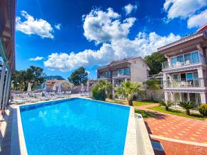 Πισίνα στο ή κοντά στο Nokta Hisar Suit Apart, Fethiye, Ölüdeniz +3 φωτογραφίες