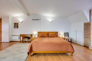 Postel nebo postele na pokoji v ubytování Boutique Hotel