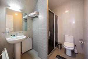 Koupelna v ubytování Boutique Hotel