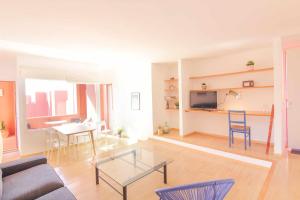 a living room with a couch and a table at Apartment in Muralla Roja - 0413 in Calpe