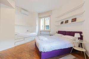 Posteľ alebo postele v izbe v ubytovaní JOIVY Apartments by the lake + 31 fotografií