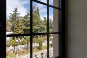 a view from a window of a park at Hotel & Spa Convento San Francisco in Soria