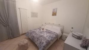 Postel nebo postele na pokoji v ubytování I 4 bimbi