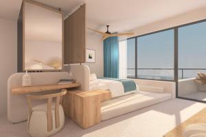 een slaapkamer met een bed en een groot raam bij Ventale Island Breeze Resort in Kavros