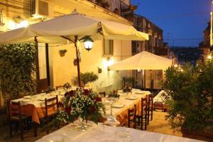 En restaurang eller annat matställe på L'Altra Modica Locazione Turistica
