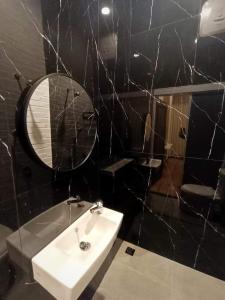 Kylpyhuone majoituspaikassa Perum Bulog Asri