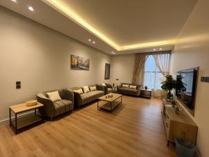 Μια τηλεόραση ή/και κέντρο ψυχαγωγίας στο السكن المثالي - alsakan almithaliu