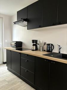 Η κουζίνα ή μικρή κουζίνα στο Onyx Black +9 φωτογραφίες