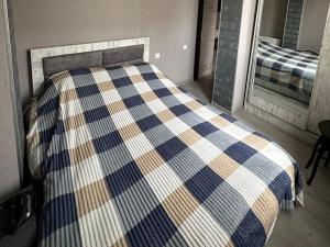 Postel nebo postele na pokoji v ubytování Апартаменты в Кобулети