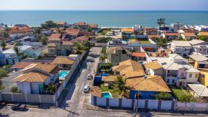 an aerial view of a residential neighborhood with houses at Linda casa com piscina em Interlagos Vila Velha ES in Vila Velha
