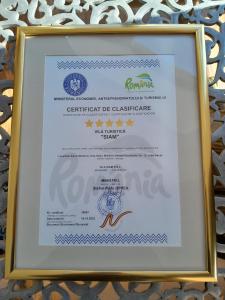 a framed certificate of qualification for the certificate of qualification for certificates of achievement at Vila Siam - adults only holiday retreat in Slănic-Moldova